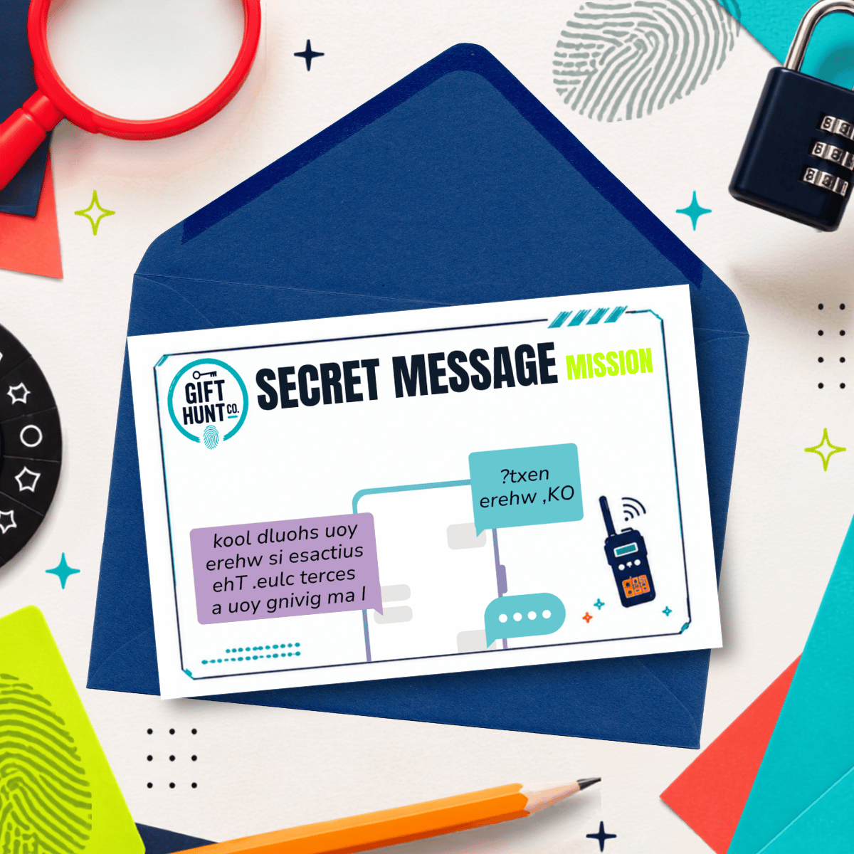 A flat-lay of a 'Gift Hunt' secret message card with a blue envelope, surrounded by themed props like a magnifying glass, lock, and pencil on a white background.